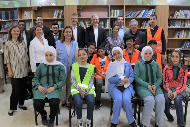 Members of a high-level delegation from the European Union pose for a group photo during a visit to Baqa’a camp on Saturday (Photo courtesy of UNRWA/Dima Ismail)