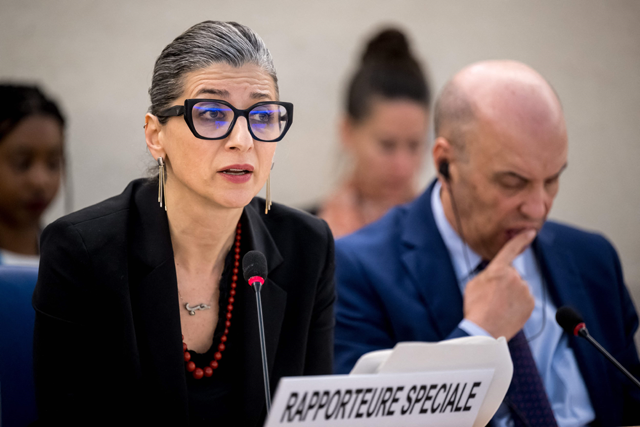 United Nations (UN) Special Rapporteur on the  Rights Situation in the Palestinian Territories, Francesca Albanese (left), delivers her rapport next to the president of the UN Human Rights Council Omar Zniber, during a session of the UN Human Rights Council, in Geneva, on Tuesday (AFP photo)