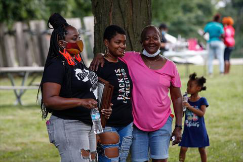 Community members attend ‘The People's Cookout: Women's Edition’ at Washington Park in Milwaukee, Wisconsin, on Saturday (AFP photo)