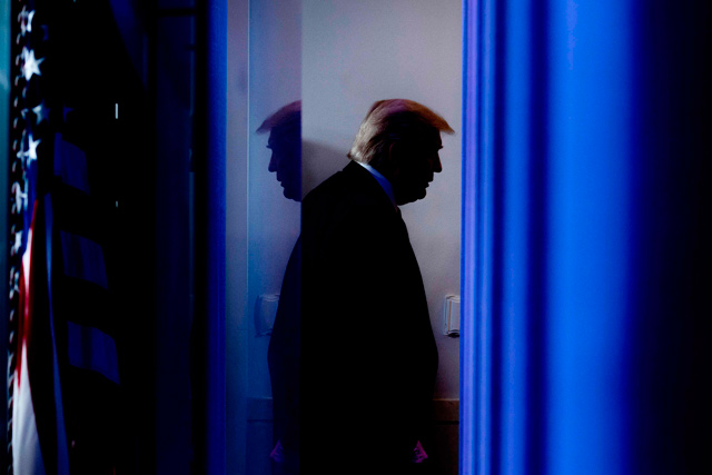 In this file photo taken on April 17, US President Donald Trump departs after speaking during the daily briefing on the novel coronavirus, which causes COVID-19, in the Brady Briefing Room of the White House in Washington, DC  (AFP photo)