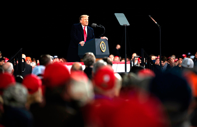 US President Donald Trump speaks during a rally to support Republican Senate candidates at Valdosta Regional Airport in Valdosta, Georgia, on Saturday (AFP photo)