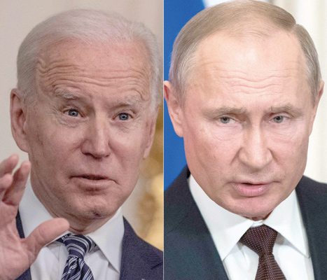 In this file combination of photos created on March 17 shows US President Joe Biden (left) during remarks on the implementation of the American Rescue Plan in the State Dining room of the White House in Washington, DC, on March 15, and Russian President Vladimir Putin as he and his Turkish counterpart hold a joint press statement following their talks at the Kremlin in Moscow on March 5, 2020 (AFP photo)