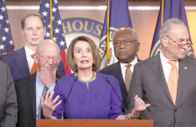 House Speaker Nancy Pelosi (D-CA) and Senate Democratic Leader Chuck Schumer (D-NY) speak to the media along with other Democratic lawmakers in Washington, US, on Wednesday (Reuters photo)