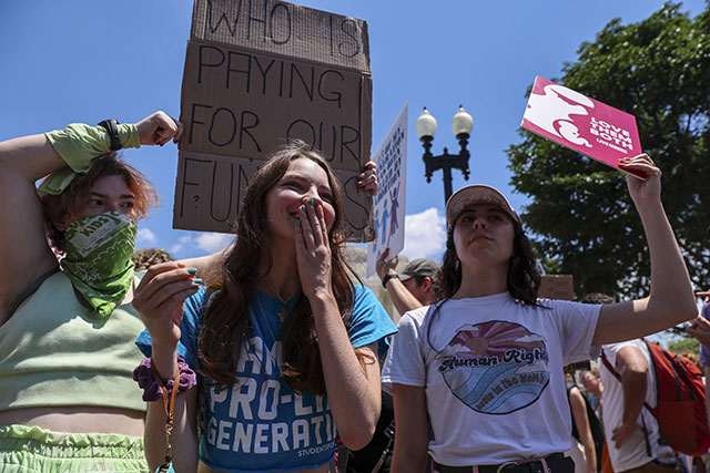 Protesters gather in the wake of the decision overturning Roe vs Wade outside the US Supreme Court on Saturday in Washington, DC (AFP photo)
