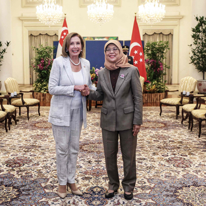 This handout photo taken and released by Singapore's Ministry of Communications and Information on Monday shows Singapore's President Halimah Yacob shaking hands with US Speaker of the House Nancy Pelosi at the Istana Presidential Palace in Singapore during a visit to the Asia-Pacific region (AFP photo)
