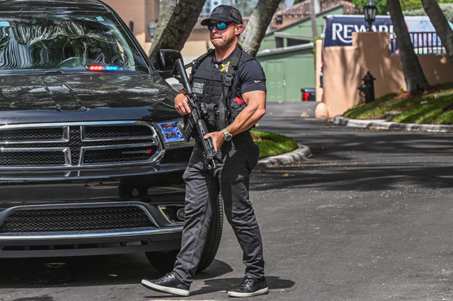 A secret service agent is seen in front of the home of former president Donald Trump at Mar-A-Lago in Palm Beach, Florida, on Tuesday (AFP photo)