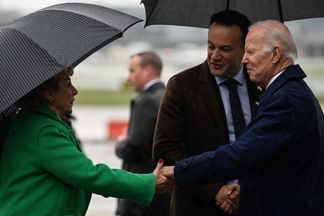 US President Joe Biden (right) is welcomed by Ireland’s Prime Minister Leo Varadkar (centre) and ambassador of Ireland to the United States  upon arrival at the Dublin International airport, on Wednesday (AFP photo)