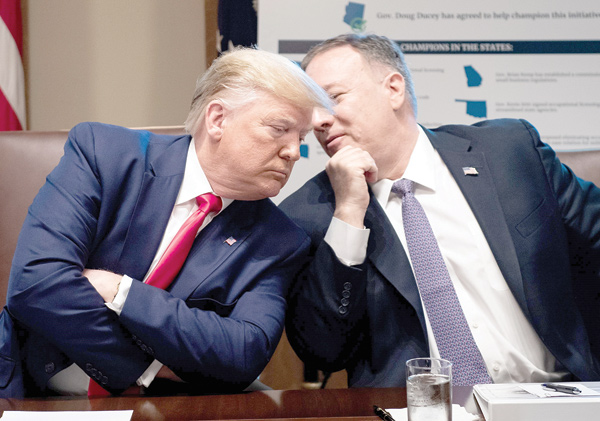 This file photo taken on October 21, US President Donald Trump listens to US Secretary of State Mike Pompeo during a Cabinet meeting at the White House in Washington,DC (AFP photo)