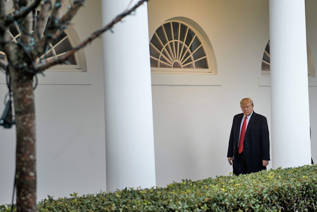 In this file photo taken on Tuesday, US President Donald Trump walks to a meeting with Guatemala's President Jimmy Morales in the Oval Office of the White House in Washington, DC (AFP photo)