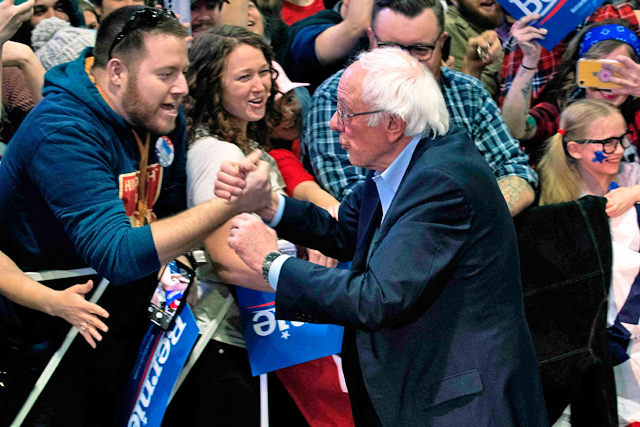 Democratic presidential candidate Vermont Senator Bernie Sanders greets supporters after a campaign rally in Denver, Colorado, on Sunday (AFP photo)