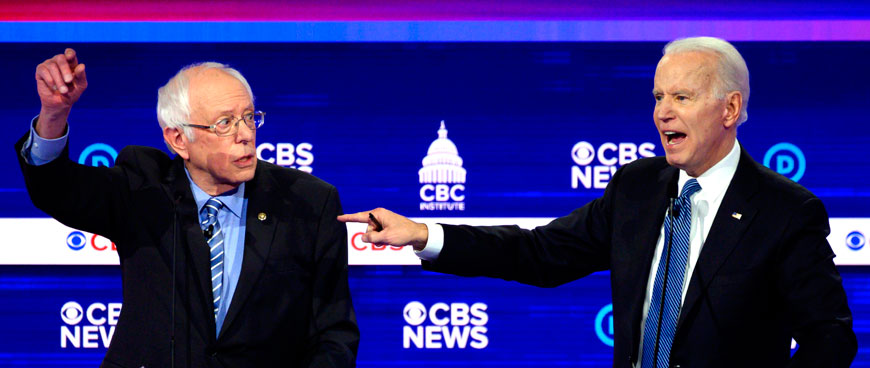 Democratic presidential hopefuls Vermont Senator Bernie Sanders (left) and former vice president Joe Biden gesture as they participate in the tenth Democratic primary debate of the 2020 presidential campaign season co-hosted by CBS News and the Congressional Black Caucus Institute at the Gaillard Centre in Charleston, South Carolina, on Tuesday (AFP photo)