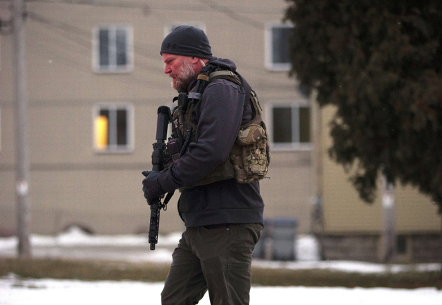A law enforcement officer patrols the scene of a shooting at the Molson Coors Brewing Co. campus on Wednesday in Milwaukee, Wisconsin (AFP photo)