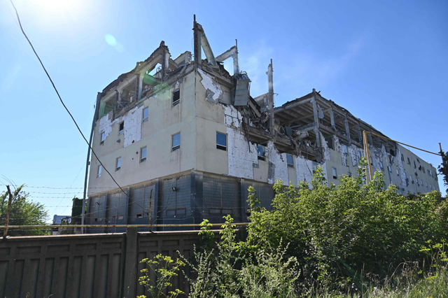 A Press House, a complex of a printing company, editorial offices and shops is photographed in Kharkiv as it was damaged by missile strike on Sunday morning, amid the Russian invasion of Ukraine (AFP photo)