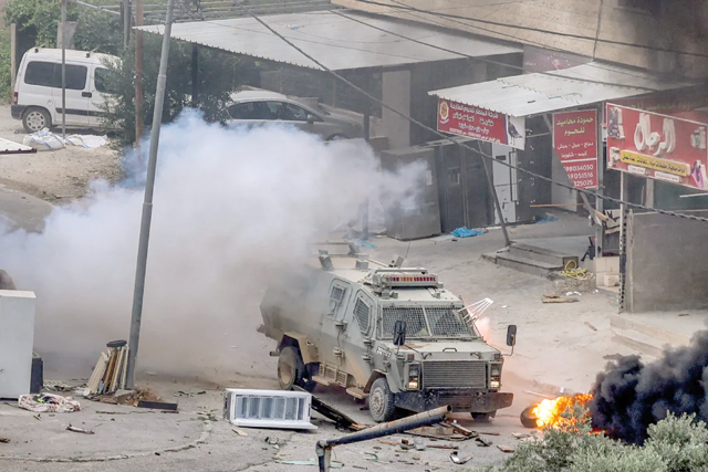 An Israeli armoured vehicle during an Israeli army raid in Jenin (AFP photo)