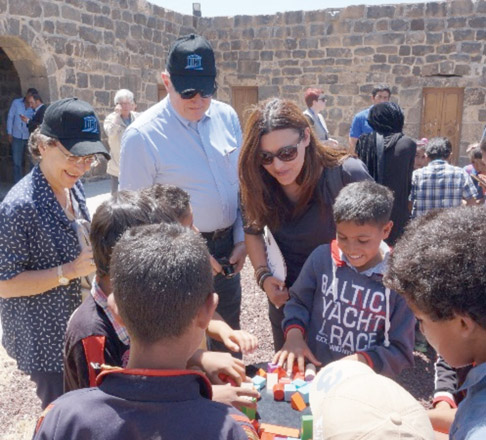 Costanza Farina, Francesco Bandarin and Marisa Matias enjoy children’s heritage education activities at Umm Al Jimal recently (Photo courtesy of UNESCO)