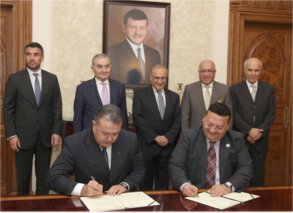Anani, Comanescu attend the signing of a cooperation agreement between the Jordan Chamber of Commerce and the Chamber of Commerce and Industry of Romania on Wednesday (Petra photo)
