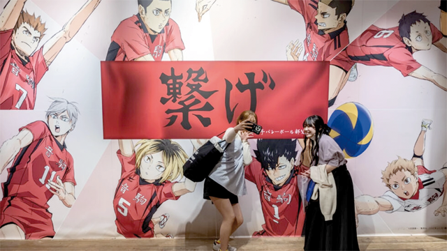 People take selfies at a pop-up store for the Japanese volleyball manga series ‘Haikyu!!’ in Tokyo (AFP photo)