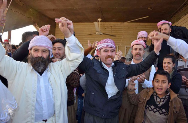Iraqi Yazidis visit their temple during a ceremony in the town of Bashiqa, some 20 kilometres north east of Mosul, on January 12 (AFP photo)