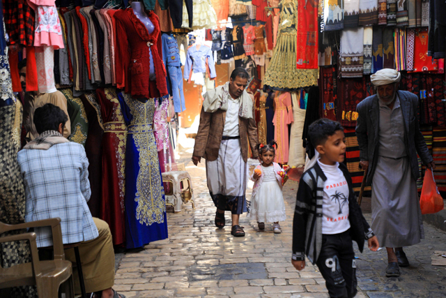 Yemenis shop at a market in the old city of the Yemeni capital Sanaa on the first day of the Muslim holy month of Ramadan, on Saturday (AFP photo)