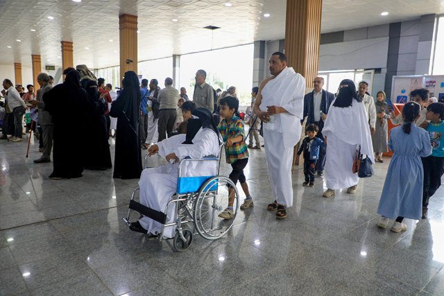 Yemeni Muslims wait at the Sanaa International Airport to board a flight heading to Mecca to perform the Hajj pilgrimage, on Saturday (AFP photo)