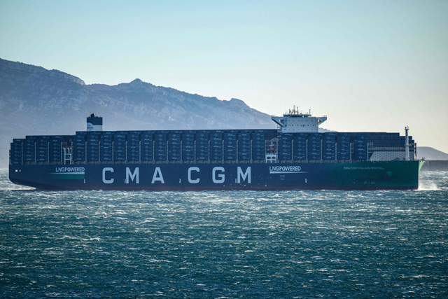 The ‘CMA CGM Palais Royal’, the world's largest container's ship powered by natural gas, sails in the bay of Marseille, southern France, on December 14 (AFP photo)