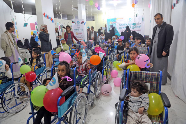Disabled Yemeni children sit on their newly received wheelchairs which was donated by the state of Kuwait, in the port city of Hodeida, on Tuesday (AFP photo)