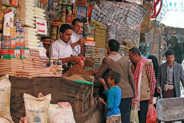 Yemenis shop at a market in the old city of the capital Sanaa on Thursday (AFP photo)