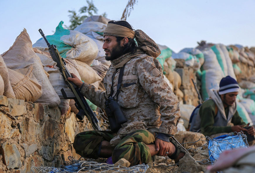 Yemeni tribesmen from the Popular Resistance Committees, supporting forces loyal to Yemen’s Saudi-backed President Abed Rabbo Mansour Hadi, hold a position in the country’s third city Taez, on Wednesday (AFP photo)