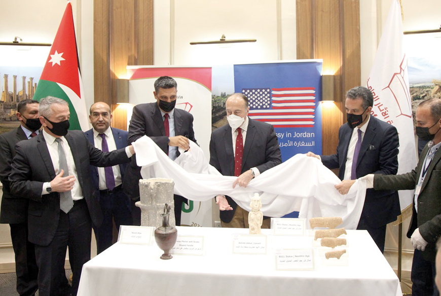 The nine antiquities are revealed during the handover ceremony at the Department of Antiquities on Tuesday  (Petra photo)