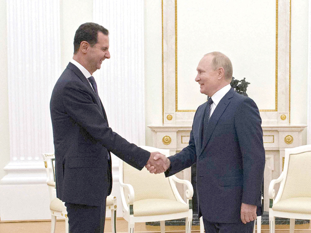 Russian President Vladimir Putin meets with Syrian President Bashar Assad at the Kremlin in Moscow on September 13, 2021 (AFP photo)