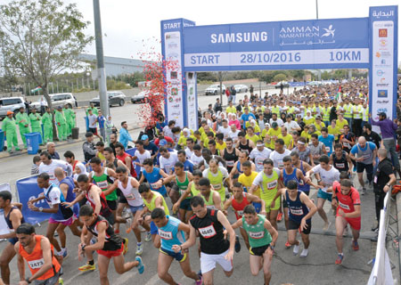 Runners at the start of the 10km race of the Samung Amman Marathon in Amman on Friday (Photo by Amjad Ghsoun)