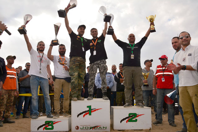 Winners on the podium of the first round of the 4x4 Jordan Championship at the Dead Sea on Friday (Photo by Amjad Ghsoun)