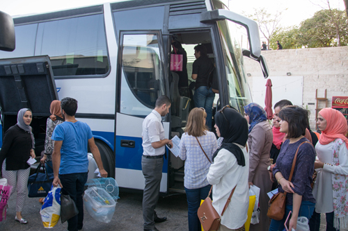 Passengers boarding a JETT bus from Tabarbour station in Amman to Irbid on Saturday (Photo by Amjad Ghsoun)