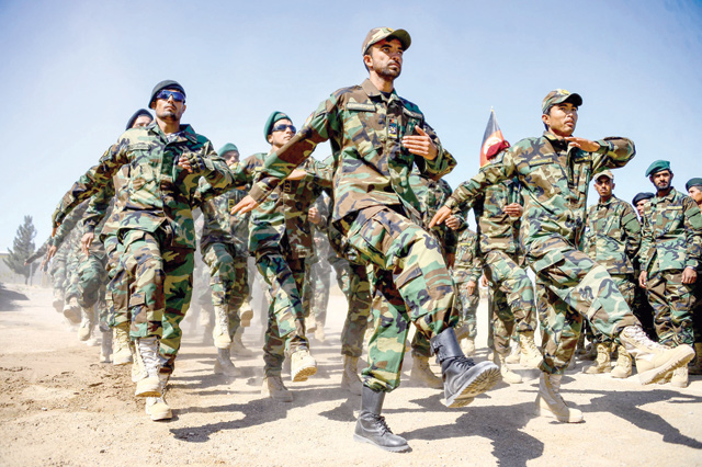 In this file photo taken on October 11, 2020, Afghan National Army soldiers march during a ceremony at a military base in the Guzara district of Herat province (AFP photo)