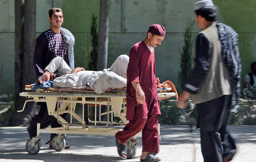 A wounded Afghan receives treatment at a hospital in Zabul on Monday (AFP photo)