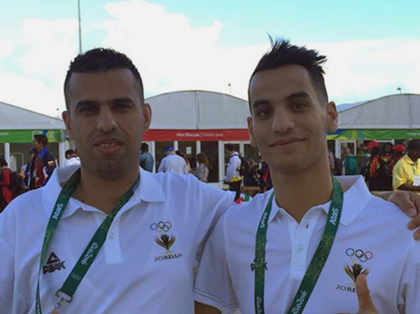 Jordan taekwondo star Ahmad Abu Ghaush (right) with his coach Faris Al Assaf after practice in Rio de Janeiro for the Olympic Games on Wednesday (Photo courtesy of JOC News Service)