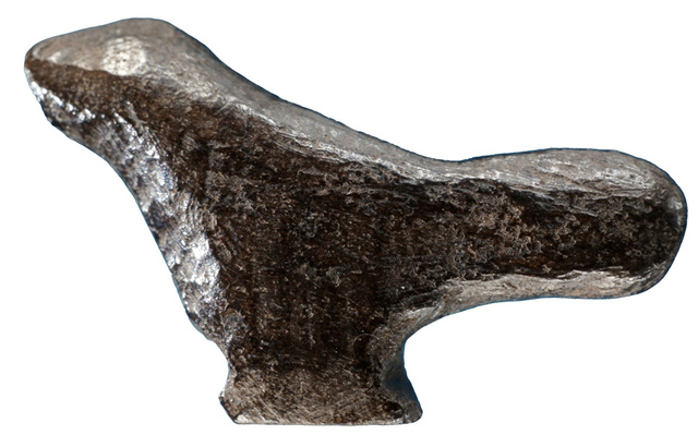 This miniature bird sculpture carved of burnt bone from China’s Henan Province dating to about 13,500 ago is seen in this photo released on Wednesday (AFP photo)