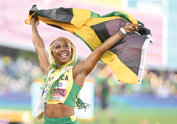Jamaica’s Shelly-Ann Fraser-Pryce celebrates winning the women’s 100m final during the World Athletics Championships at Hayward Field in Eugene, Oregon on Sunday (AFP photo by Jewel Samad)