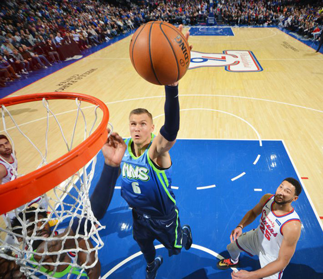Kristaps Porzingis of the Dallas Mavericks dunks against the Philadelphia 76ers during their NBA game in Philadelphia on Friday (AFP photo by Jesse D. Garrabrant)