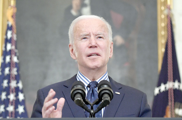 In this file photo US President Joe Biden speaks on the passage of the American Rescue Plan in the State Dining Room of the White House in Washington, DC, on Saturday (AFP photo)