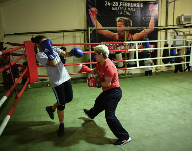 Steluta Duta (right) and Bianca Lacatusu take part in a boxing training session in Buzau, Romania, on Monday  (AFP photo by Daniel Mihailescu)