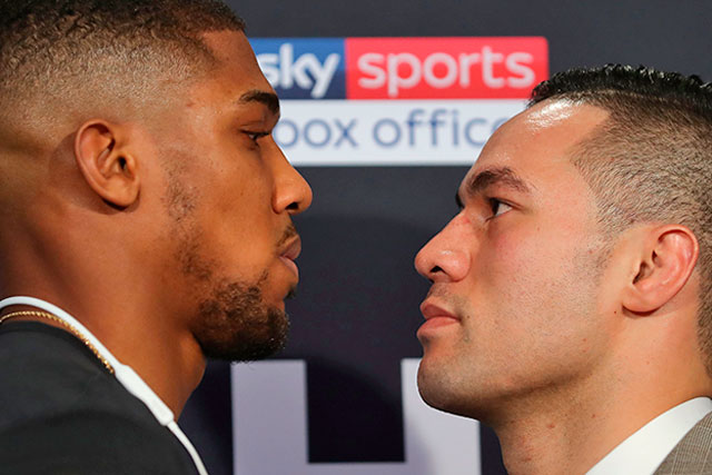Britain’s Anthony Joshua (left) and New Zealand’s Joseph Parker face off posing during a press conference in London on Tuesday ahead of their world heavyweight title unification boxing bout (AFP photo)