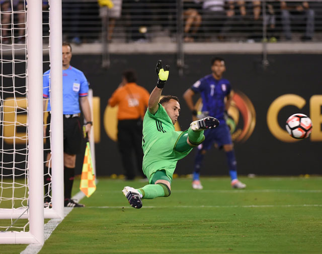 Colombia’s goalkeeper David Ospina stops a penalty shot by Peru’s Miguel Trauco during the Copa America quarter-final match in East Rutherford, New Jersey, United States, on Friday (AFP photo by Timothy A. Clary)