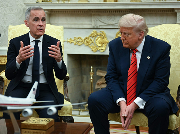 US President Donald Trump looks on as Canadian Prime Minister Mark Carney speaks in the Oval Office of the White House in Washington, DC, on May 6, 2025 (AFP photo)