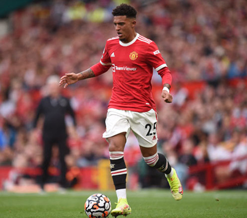 Manchester United striker Jadon Sancho runs with the ball against Newcastle during their English Premier League match in Manchester, on September 11 (AFP photo by Oli Scarff)