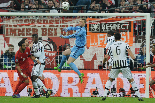 Bayern’s goalkeeper Manuel Neuer (centre) jumps for the ball during the Champions League round of 16 second leg match against Juventus Turin in Munich, on Wednesday (AP photo by Kerstin Joensson)