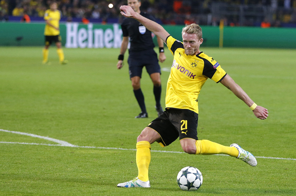 Borussia Dortmund’s Andre Schuerrle scores his side’s 2nd goal during the Champions League Group F football match against Real Madrid in Dortmund, Germany, on Tuesday (AP photo by Michael Probst)