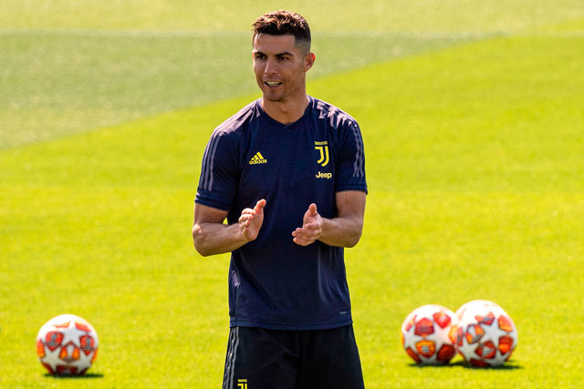 Juventus’ Portuguese forward Cristiano Ronaldo attends a training session on the eve of the UEFA Champions League football match Ajax vs Juventus on Tuesday at the Juventus Training Centre in Turin (AFP photo by Marco Bertorello)