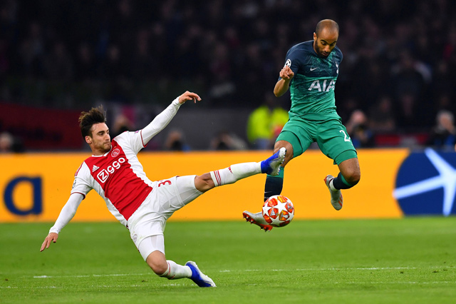 Ajax’s Nicolas Tagliafico in action against Tottenham’s Lucas Moura during their Champions League semifinal second leg match in Amsterdam, Netherlands, on Wednesday  (Reuters photo by Dylan Martinez)