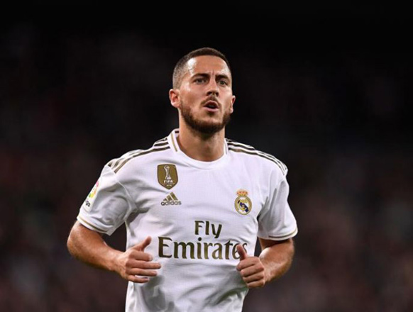 Real Madrid’s Belgian forward Eden Hazard runs during the Spanish League football match against Real Betis in Madrid on Saturday  (AFP photo)